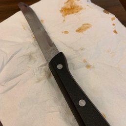Food that I wiped from my knife.  I had not yet used it.
