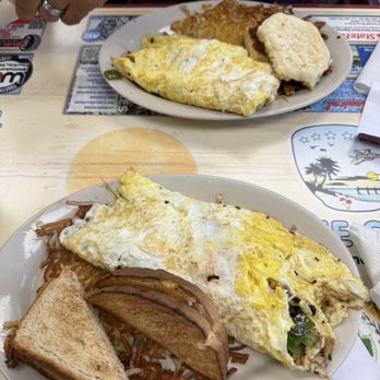 The Cafe - Western omelette with biscuit Philly steak omelette (bottom) - Breakfast & Brunch Near Me - Panama City, Florida The Cafe - Western omelette with biscuit Philly steak omelette (bottom) - Breakfast & Brunch Near Me - Panama City, Florida