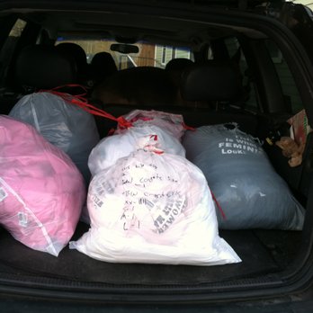 American Trophy - Bags of terribly printed shirts - Trophy Shops Near Me - East Providence, Rhode Island
