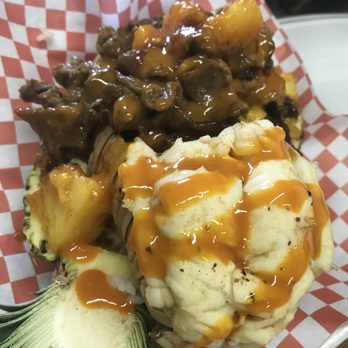 Stop One Kitchen - Steak & Lobster Tail Pineapple Bowl - Soul Food Near Me - Rochester, New York Stop One Kitchen - Steak & Lobster Tail Pineapple Bowl - Soul Food Near Me - Rochester, New York