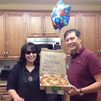 Pizza Factory - Gina delivering a special pizza order to a very happy customer/birthday boy! - Pizza Near Me - Minden, Nevada