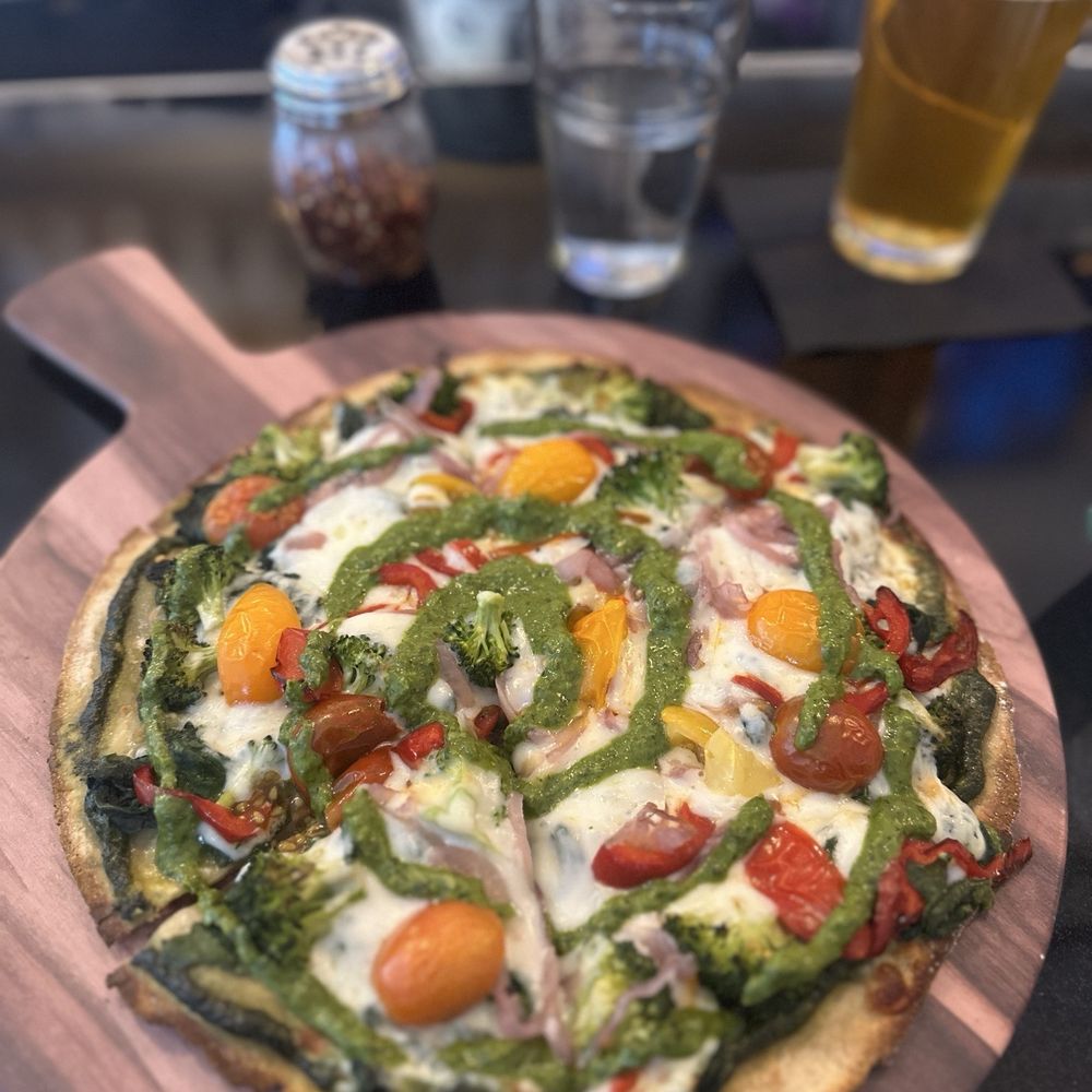 Wild Park Slope - Pizza al pesto. Pizza topped with tomatoes, broccoli, onions, peppers, spinach, cheese, and pesto sauce - Pizza Near Me - Brooklyn, New York Wild Park Slope - Pizza al pesto. Pizza topped with tomatoes, broccoli, onions, peppers, spinach, cheese, and pesto sauce - Pizza Near Me - Brooklyn, New York