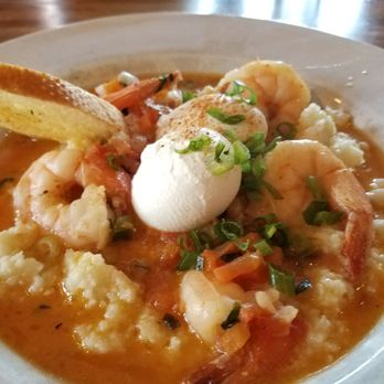 Iron Rooster - Shrimp and grits with poached eggs - Cocktail Bars Near Me - Annapolis, Maryland