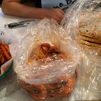 The Boiling Crab - Who sha bang with shrimp and corn on the cob. Side with sweet potato fries. - Seafood Near Me - Alhambra, California The Boiling Crab - Who sha bang with shrimp and corn on the cob. Side with sweet potato fries. - Seafood Near Me - Alhambra, California