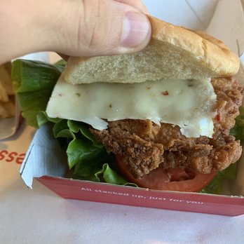 Chick-fil-A - Spicy Chicken Sandwich Deluxe - Fast Food Near Me - Surprise, Arizona Chick-fil-A - Spicy Chicken Sandwich Deluxe - Fast Food Near Me - Surprise, Arizona