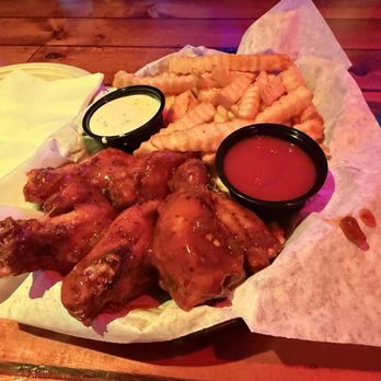 Wooden Nickel Tavern - Mango habanero hot wings and fries - Burgers Near Me - Tucson, Arizona