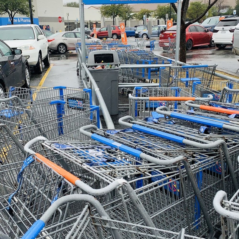 Walmart Supercenter - shopping carts in a parking lot - Department Stores Near Me - Irving, Texas Walmart Supercenter - shopping carts in a parking lot - Department Stores Near Me - Irving, Texas