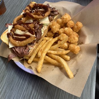 Burnt Lemon Grill - BBQ Pastrami sandwich with half fries and half tots - New American Near Me - Twin Falls, Idaho Burnt Lemon Grill - BBQ Pastrami sandwich with half fries and half tots - New American Near Me - Twin Falls, Idaho