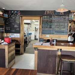 Bar and kitchen area and beer board