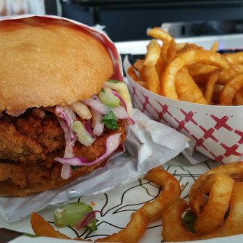 The Bird - FRIED CHICKEN SANDWICH (SPICY): celery, house made apple slaw, mayo, pickles, and bun ($8) & CURLY FRIES - Chicken Shop Near Me - San Francisco, California The Bird - FRIED CHICKEN SANDWICH (SPICY): celery, house made apple slaw, mayo, pickles, and bun ($8) & CURLY FRIES - Chicken Shop Near Me - San Francisco, California