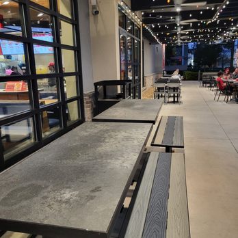 Raising Cane's Chicken Fingers - Outdoor seating very spacious and with ceiling fans! - Fast Food Near Me - Pompano Beach, Florida Raising Cane's Chicken Fingers - Outdoor seating very spacious and with ceiling fans! - Fast Food Near Me - Pompano Beach, Florida