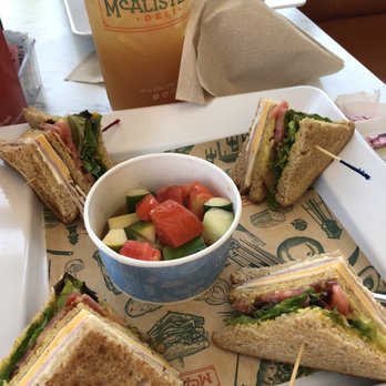 McAlister's Deli - McAlister's Club and cucumbers and tomatoes salad - Sandwiches Near Me - Orlando, Florida McAlister's Deli - McAlister's Club and cucumbers and tomatoes salad - Sandwiches Near Me - Orlando, Florida