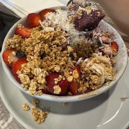 Half eaten açaí bowl Half eaten açaí bowl