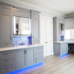 Change Your Bathroom - Bathroom renovation with layout change and added bathroom storage.