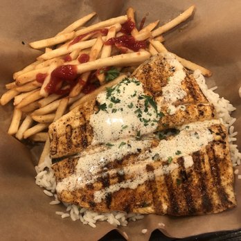 Hook'd Fish Grill - Grilled Trout on a bed of rice - Seafood Near Me - Northridge, California Hook'd Fish Grill - Grilled Trout on a bed of rice - Seafood Near Me - Northridge, California