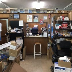Burch-Ogden-Schrader - Counter with various lightbulbs and parts