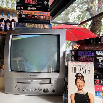 Botte Bar - Seating at the bar gives you a view of the old school VHS tv - Cocktail Bars Near Me - Astoria, New York Botte Bar - Seating at the bar gives you a view of the old school VHS tv - Cocktail Bars Near Me - Astoria, New York