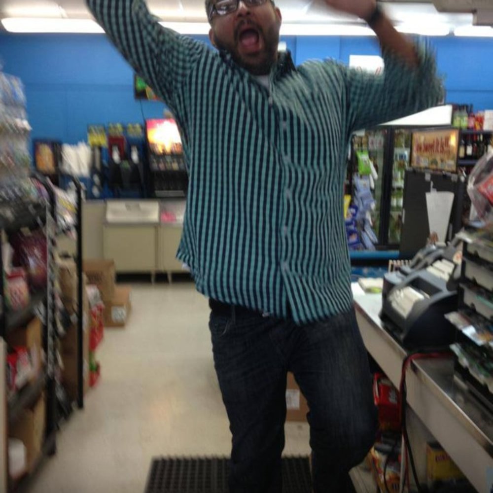 Moon's Food Store - a man standing in a store - Convenience Stores Near Me - Lakewood, Ohio