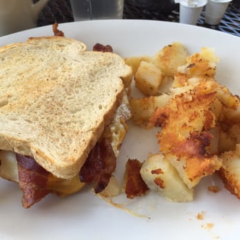 Griddlecakes - Breakfast sandwich with egg over medium....perfectly cooked egg! - American Near Me - Las Vegas, Nevada Griddlecakes - Breakfast sandwich with egg over medium....perfectly cooked egg! - American Near Me - Las Vegas, Nevada
