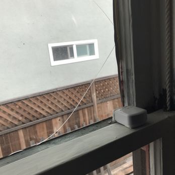 Paul's Glass - Crack in glass on double hung window - quick & easy replacement of window pane. - Windows Installation Near Me - Long Beach, California