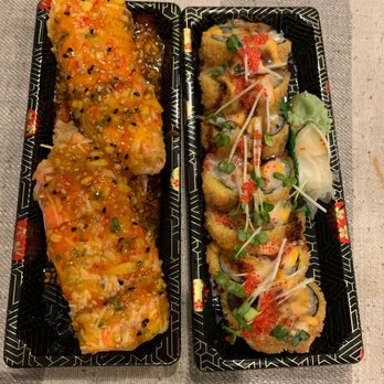Sakura - two trays of food on a table - Asian Fusion Near Me - Walpole, Massachusetts