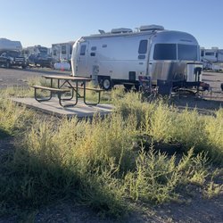 Trail and Hitch RV Park and Tiny Home Hotel - Weeds over growing campsites