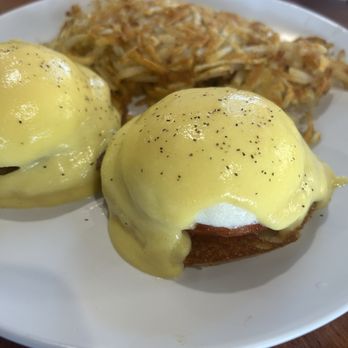 JGoody Cafe Bakery - Eggs Benedict. Amazing. FYI, they include tomato. Eggs poached perfectly. Hash browns excellent. - Bakeries Near Me - Oldsmar, Florida