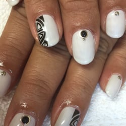 Nails By Nana - She draws out my chosen designs she does it by hand... Love my Polynesian designs