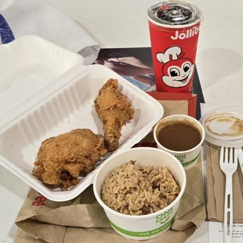 Jollibee - 8-17-24:  two piece chickenjoy (pretty good) with Adobo fried rice (kinda heavy on the garlic!) - Chicken Shop Near Me - Honolulu, Hawaii