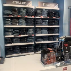 Lucky Brand - Jeans behind the cashier.