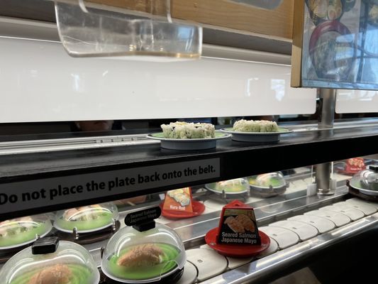 Kura Revolving Sushi Bar by null
