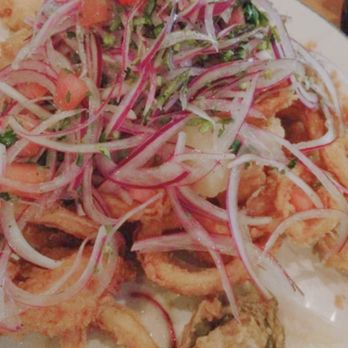 Happy Fish - Mixed grilled seafood - Peruvian Near Me - Tampa, Florida Happy Fish - Mixed grilled seafood - Peruvian Near Me - Tampa, Florida