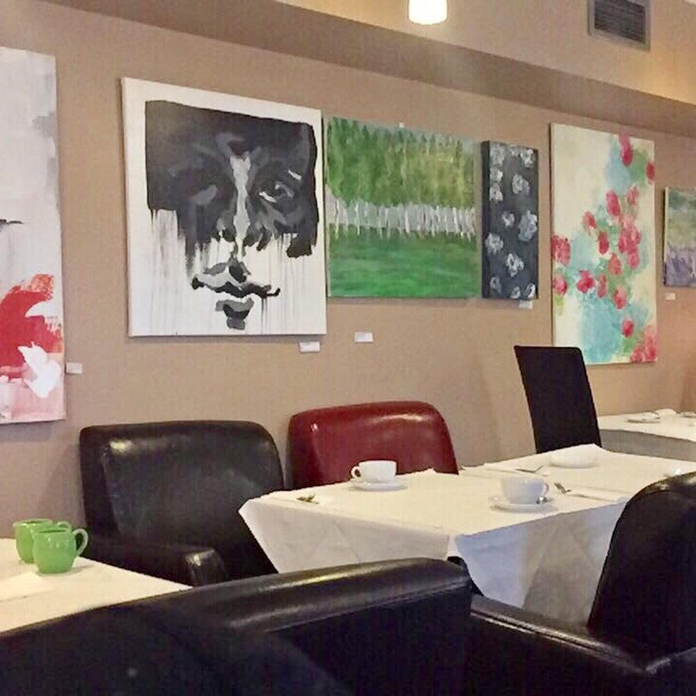 Pretty paintings line the wall Pretty paintings line the wall