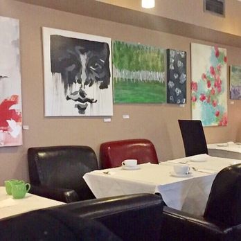T-Buds - Pretty paintings line the wall - Desserts Near Me - Toronto, Ontario