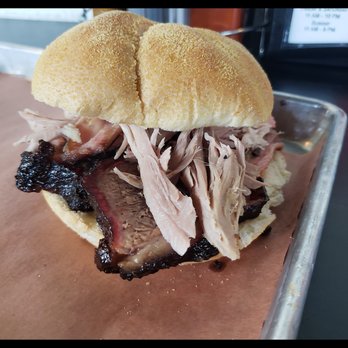 Fuel BBQ - The Bus Stop, is a sandwich creation of Brisket and regular Pulled Pork with Coleslaw, although the coleslaw is on the side - Barbeque Near Me - Sanford, Florida