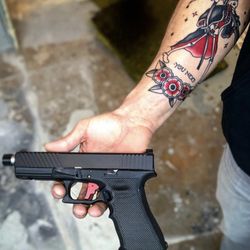 Glock, cerakote, stipple, laser engraving, custom gsun, gun smith, gun store, gun shop