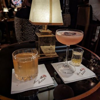 Delilah - Smokey whiskey and some kind of blood orange drink with champagne and boba - New American Near Me - Las Vegas, Nevada Delilah - Smokey whiskey and some kind of blood orange drink with champagne and boba - New American Near Me - Las Vegas, Nevada