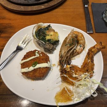 Trenasse - Clockwise from top left: Oysters Rockefeller, Unca Duke's BBQ Shrimp, Buffalo Frog Legs, Fried Green Tomato - Wine Bars Near Me - New Orleans, Louisiana Trenasse - Clockwise from top left: Oysters Rockefeller, Unca Duke's BBQ Shrimp, Buffalo Frog Legs, Fried Green Tomato - Wine Bars Near Me - New Orleans, Louisiana
