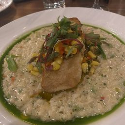 Pan seared halibut with Parmesan edamame risotto with a corn relish