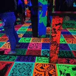 Deluxx Fluxx - The dance floor is a neon explosion!