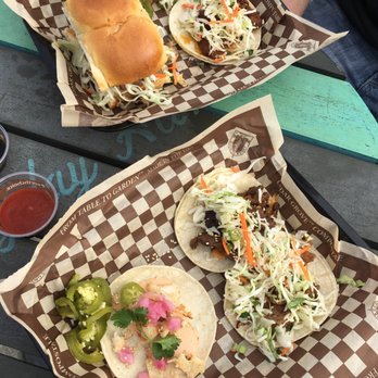 Marination Ma Kai - Pork sliders and pork taco on top, one of each on bottom: beef, fish, and chicken tacos - Korean Near Me - Seattle, Washington Marination Ma Kai - Pork sliders and pork taco on top, one of each on bottom: beef, fish, and chicken tacos - Korean Near Me - Seattle, Washington