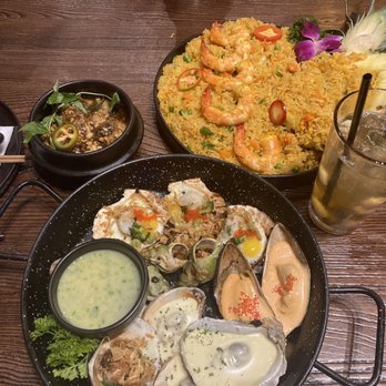 HEM Kitchen And Bar - Grilled seafood combo Pineapple fried rice Tamarind balut - Vietnamese Near Me - Houston, Texas HEM Kitchen And Bar - Grilled seafood combo Pineapple fried rice Tamarind balut - Vietnamese Near Me - Houston, Texas