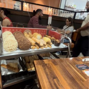 Cafe De Olla - This is how they come and offer the pan dulce! Soo cute - American Near Me - Monrovia, California