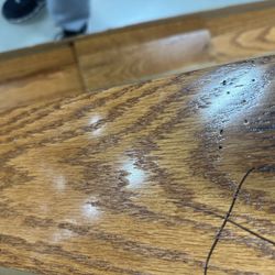 Floor & Decor - Examples of small holes in the wood