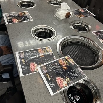 Gangnam - Grill and hotpot stations at the large tables - Sushi Bars Near Me - Fayetteville, North Carolina