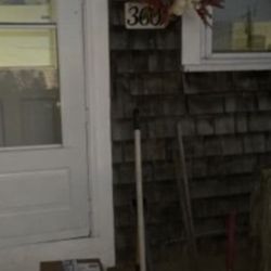 LaserShip - this was the picture that lasership took (notice the OBSCURE placement of the wreath) that conveniently covers the house # plaque....