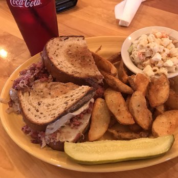 Big Pine Rooster - Two hand reuben. The guy that ordered it (not me) did not get through the whole thing. With pasta salad and fries. - American Near Me - Big Pine Key, Florida Big Pine Rooster - Two hand reuben. The guy that ordered it (not me) did not get through the whole thing. With pasta salad and fries. - American Near Me - Big Pine Key, Florida