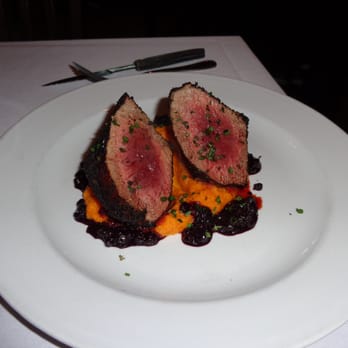 Local Restaurant & Bar - Buffalo medallions with sweet potatoes and huckleberry glaze. - New American Near Me - Jackson, Wyoming Local Restaurant & Bar - Buffalo medallions with sweet potatoes and huckleberry glaze. - New American Near Me - Jackson, Wyoming