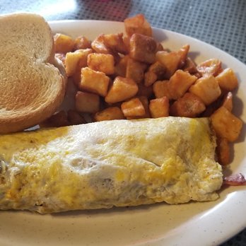 The Lunchbox - Omelette with ham, sausage, bacon, and cheese with homefries and toast. - Diners Near Me - Tallahassee, Florida The Lunchbox - Omelette with ham, sausage, bacon, and cheese with homefries and toast. - Diners Near Me - Tallahassee, Florida