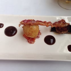 Tom Browns Restaurant - Breaded hens egg, mushroom, sausage, bacon & brown sauce starter.